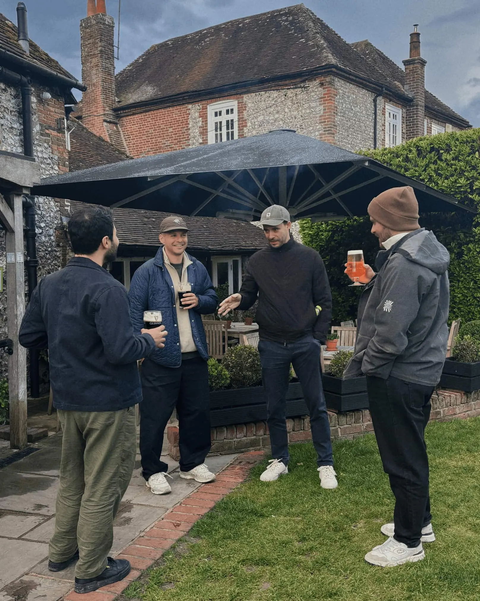 The Quartz team meeting outdoors during a team retreat